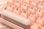 TAVNIXO F3587 wired mechanical keyboard feature: translucent rounded keycaps detail
